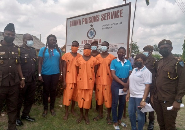 Isaac Adu, Henry Ebenezer Richard Akornor, and Samuel Larweh with officials of CHRI and authorities of the Koforidua Prisons 