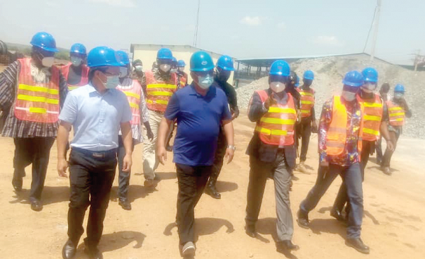 Mr Stephen Yakubu (arrowed),  Upper East Regional Minister,  with members of the REGSEC at the premises of Shaanxi Mining Ghana Limited
