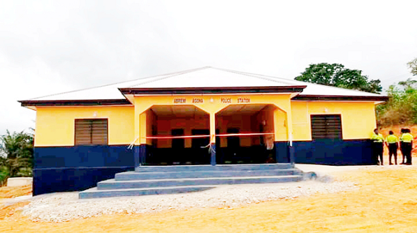 The newly built police station at Abrem Agona. Inset: From left:  Apostle Samuel Yaw Antwi, DCOP Twumasi-Sarpong and NanaTerkpor V cutting a tape to inaugurate the new police station