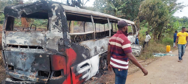 The passenger bus that caught fire after crashing into the recovery truck