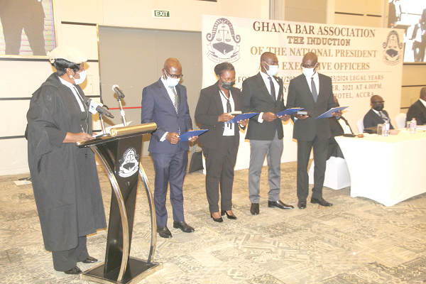 Her Lordship Sophia Rosetta Bernasko-Essah (left), a Justice of the Court of Appeal, administering the oath of secrecy to the new executive of the Ghana Bar Association.  Picture: ESTHER ADJEI 