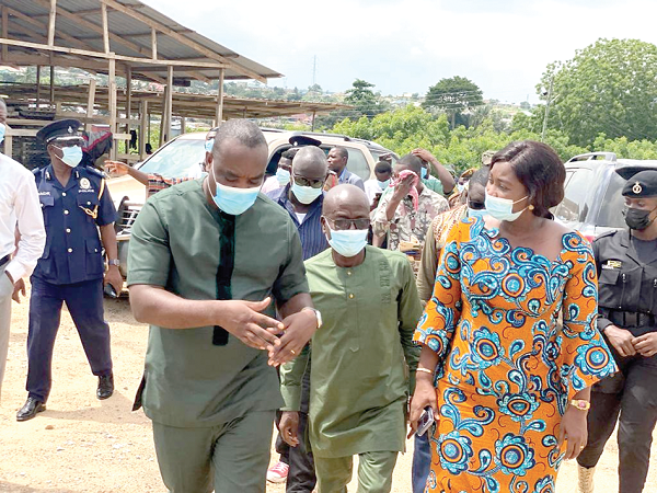 Mr Kojo Asemanyi (left) explaining a point to Mrs Justina Marigold Assan (right), the Central Regional Minister, during a visit to the project site of Debridge Industries. With them is Tony Kwansrah, CEO of Debridge Industries