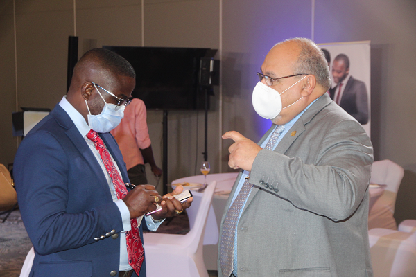 Mr Charles Benoni Okine (left), Assistant Editor, Graphic Business, interwiewing Mr Farid Antar, MD, Republic Bank, Ghana Plc, shortly after the closing of the Graphic Business/Stanbic Breakfast Meeting