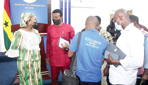  Ms Fatimatu Abubakar (left), a Deputy Minister of Information, and Mr Mark Awuah  Baah (2nd from left), Director of System Operations of GRIDCo, during an interaction with journalists after the briefing. Picture: ESTHER ADJEI