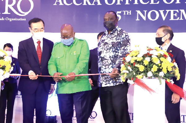 File photo: President Akufo-Addo cutting the tape for the establishment of the JETRO office in Accra. With him are Mr Alan Kyerematen (2nd from right), Minister of Trade and Industry, and Mr Nobuhiko Sasaki (left), CEO of JETRO.