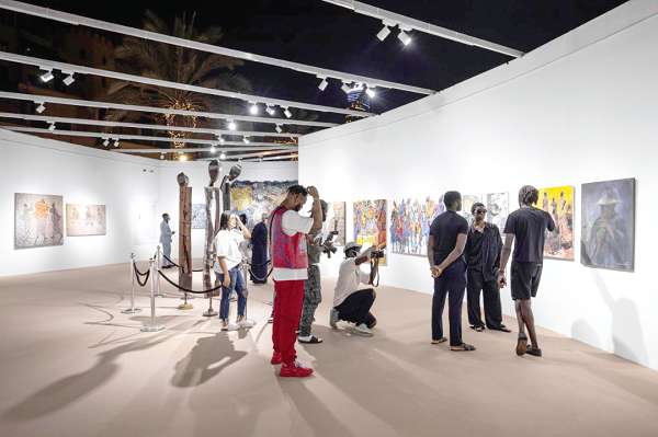 Some art collectors inspecting the new art studio