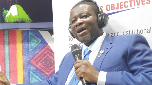 Mr Eric Nana Agyemang-Prempeh, Director General, NADMO, speaking at the Ghana Pavilion in Glasgow