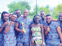 Tsooboi Ensemble shows off the trophy they won at the Ghana Entertainment and Business Industry Awards