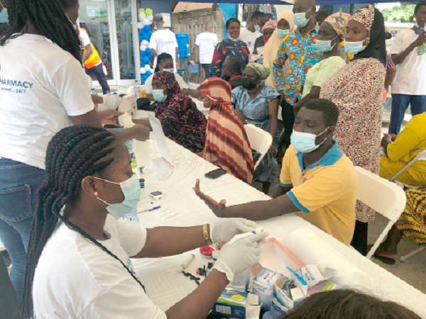 A resident of Kasoa being attended to at the health screening