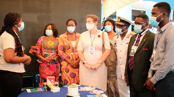 Ms Csaba (middle) with the dignitaries at one of the exhibition stands at the event. PICTURE: DELLA RUSSEL OCLOO