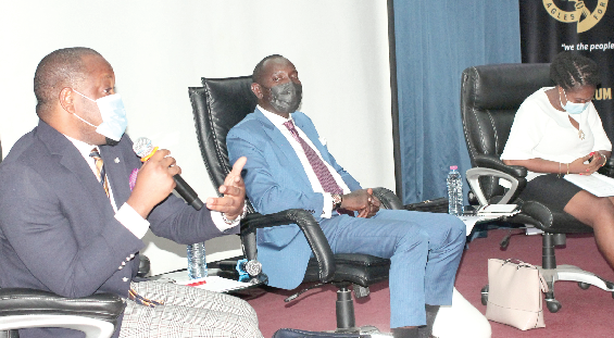 Dr. Justice Srem-Sai (left), Constitutional Rights Lawyer and lecturer, GIMPA Law School, making some remarks at the forum. With him are Mr. Lamtiig Apanga (middle), private legal practitioner, and Ms. Beatrice Annan, also a private legal practitioner. Picture: Maxwell Ocloo