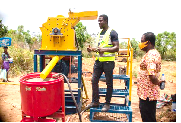 Mr Stephen Yeboah, the Chief Executive Officer of Commodity Monitor Limited, explaining the use of the mercury-free gold ore processing machine
