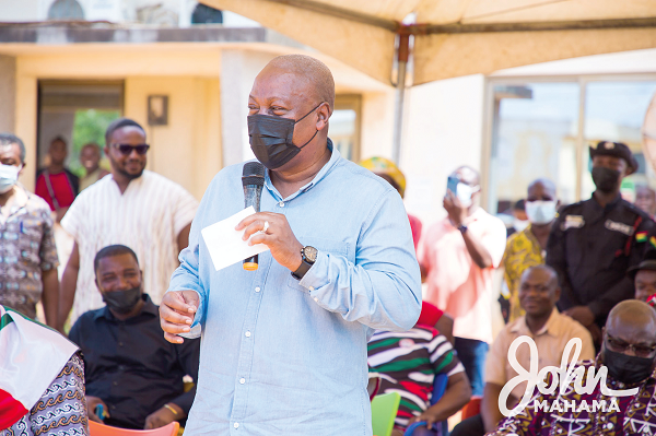 Former President Mahama speaking at the event after presenting the items