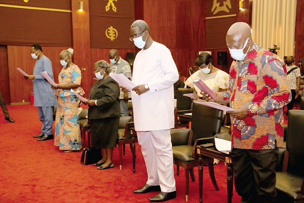 Vice-President Dr Mahamudu Bawumia (left) swearing in members of the Civil Service Council. Pix SAMUEL TEI ADANO