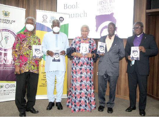 Rev. Joyce Aryee (middle), Executive Director of Salt and Light Ministries, flanked by Dr Joseph Bediako Asare (2nd from left), former Chief Psychiatrist of the Mental Health Authority, and Mr Akwasi O. Osei (left), the author of the 'History of Mental Healthcare in Ghana, launching the book.  Picture:  ESTHER ADJEI  
