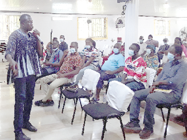 Mr Bashiru addressing the residents at the meeting