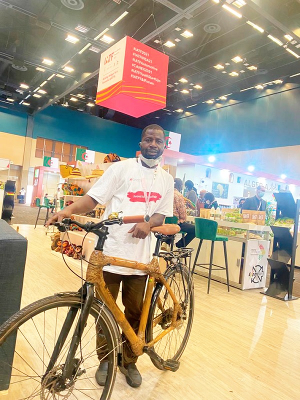 Mr Kwabena Danso displaying one of his bicycles with bamboo frames