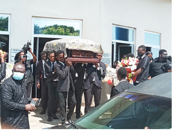 Pallbearers with the mortal remains of Mr James Dadzie