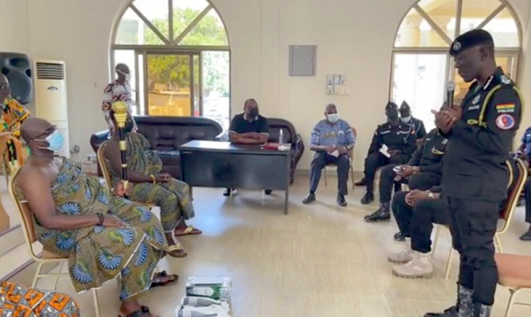 Dr George Akuffo Dampare (right), the IGP, addressing the traditional leaders at the Asogli palace