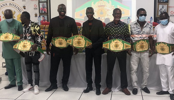  Abraham Kotei Neequaye (3rd left), GBA president, and former world champions, Azumah Nelson (right), Ike Quartey (2nd right) and Joseph Agbeko (2nd left) displaying the new national titles