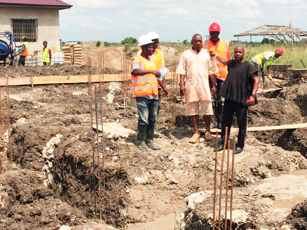 Torgbui Mawuli Gawu Dzidzienyo I (right), Asafoatse Annang Dapoh (middle) and Mr Amos Takpah, the foreman, at the construction site