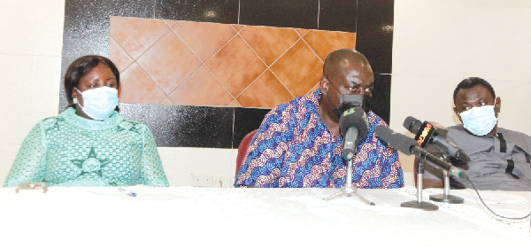 Mr Isaac Bampoe Addo (middle), Chairman of the Forum and Executive Secretary of the Civil and Local Government Staff Association,  Ghana, addressing the forum. With him are Mr King Ali Awudu (right), President, Coalition of Concerned Teachers Association, and Mrs Perpetual Ofori-Ampofo (left), President of the Ghana Registered Nurses and Midwives Association and member of the Forum. Picture: ESTHER ADJEI 