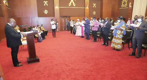 President Akufo-Addo swearing in members of the NDPC at the Jubilee House. Picture: SAMUEL TEI ADANO