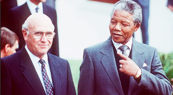 Late South African President FW de Klerk (left) and the then late deputy president of the African National Congress, Nelson Mandela. Credit: AP