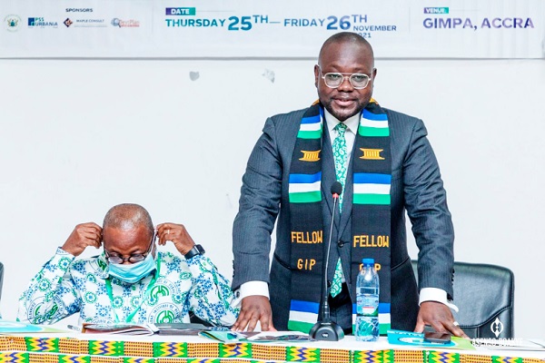 Mr Francis Asenso-Boakye (standing), Minister of Works and Housing, addressing the event after his induction