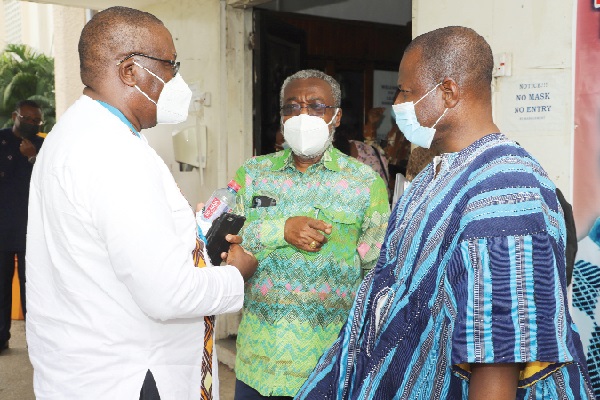 Dr Anthony Nsiah-Asare (middle), Presidential Advisor on Health, interacting with  Dr Patrick Kuma-Aboagye (right), Director General of the Ghana Health Service, and Dr Francis Chisaka Kasolo (left), WHO Representative in Ghana, after the press conference in Accra. Picture: GABRIEL AHIABOR