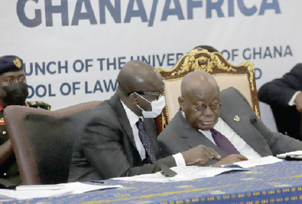 President Akufo-Addo conferring with Mr Godfred Yeboah Dame (left), Minister of Justice and Attorney-General, at the conference.  Picture: SAMUEL TEI ADANO