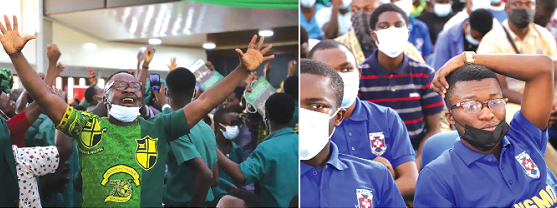      Prempeh College fan cheering on the school’s quiz team (left)     Presecans in a tense mood during the quiz (right)