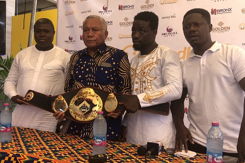  Mr Samir Captan (2nd left), WBO Africa Supervisor displays the belt with boxer Sherrif Quaye (2nd right)