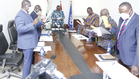  Mr Alan Kyerematen (head of table), Minister of Trade &amp; Industry, administering the oath of office to members of the Ghana Standards Authority Board. Picture: NII MARTEY M. BOTCHWAY 