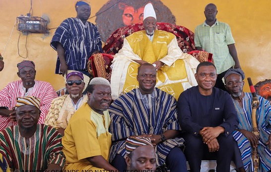 Mr. Samuel Abu Jinapor (middle) in a group photograph with Yaa Naa Abubakar Mahama II. Also in the picture is a Deputy Lands and Natural Resources Minister, Mr. George Mireku Duker (2nd right).