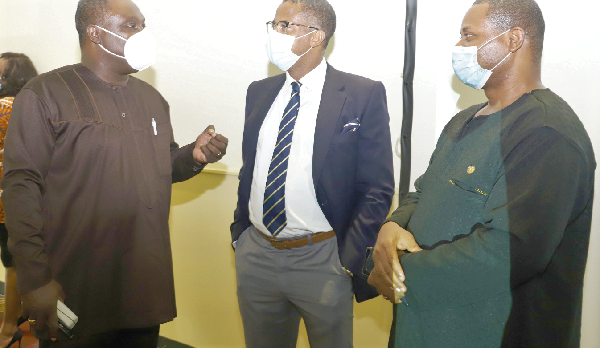 Mr Robert Ahomka-Lindsay (left), a former Deputy Minister of Trade, interacting with Mr Charles Zwennes (middle), a Private Legal Practitioner, and Mr Franklin Cudjoe (right), Executive Director of IMANI Centre for Policy and Education, at the meeting in Accra. Picture: GABRIEL AHIABOR