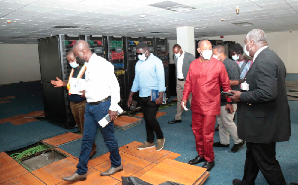  Mr Akoto Bamfo (2nd left), Consultant for the project, interacting with Mr Prosper Amemode (left), a Principal Planning Officer, Ministry of Transport, during the project monitoring. With them are a delegation from the ministry and GCAA including Mr Daniel Acquah (right), Deputy Director-General, Technical, GCAA.