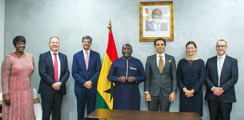  Dr Mahamudu Bawumiah (middle), the Vice-President, and Mr Rahul Dhir (3rd from left), CEO of Tullow, with some executive staff of the oil company