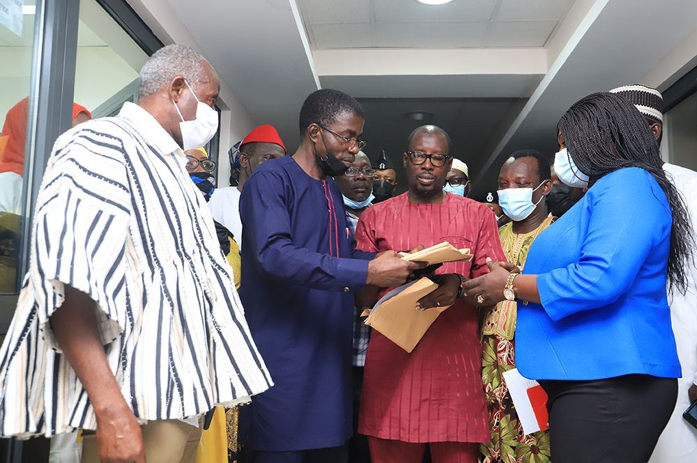 Mr Hajj Abdul Manam Abdul Rhaman (2nd left), President of COMOG, presenting the memorandum to Akua Durowaa Owusu-Agyekum (right), Secretary, Committee on Constitutional, Legal and Parliamentary Affairs. Picture: SAMUEL TEI ADANO