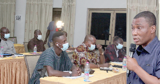 Mr. George Mireku Duker (right), Deputy Minister, Lands and Natural Resources, addressing the participants in the multi-stakeholders’ workshop