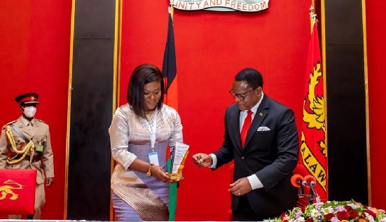 H.E Louisa Atta-Agyemang (left) presenting the award to President Dr Lazarus  McCathy Chakwera
