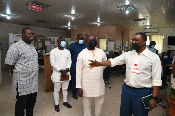 Mr Kobby Asmah (right), Editor, Daily Graphic, explaining newsroom processes to Mr Osei Asibbey Antwi (2nd right), acting Executive Director of the NSS. Picture: EMMANUEL QUAYE