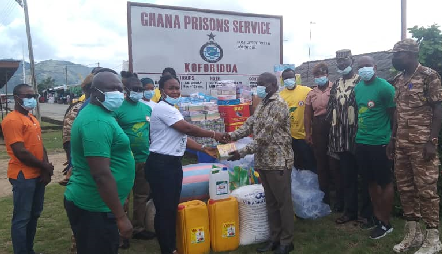 A representative of the PSGH-ER handing over the items to Assistant Director of Prisons Christopher Hayibor, the Deputy Commander of the Koforidua Prisons