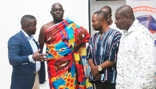 Mr. Charles Benoni Okine (left), Assistant Editor, Graphic Business, in a chat with Mr. John Owo (right), the Coordinating Director of the Sekondi-Takoradi Metropolitan Assembly and Mr. Ignatius Asaah Mensah (2nd from right), the DCE, Mpohor District, after the event. With them is Nana Kwaw Entsie II (2nd from left), the Paramount Chief of Mpohor