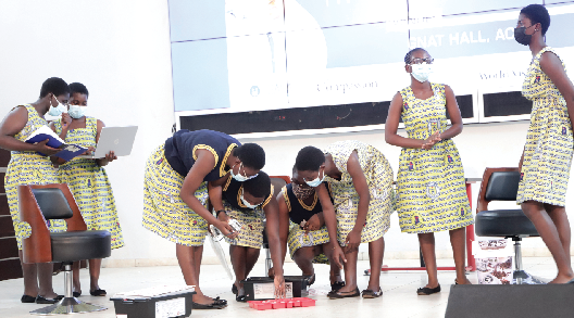 Members of the Methodist Girls High School Robotic Club in a robotic display at the event. Picture: EDNA SALVO-KOTEY