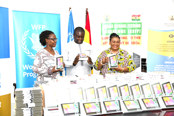  Ms Anna Mukiibi-Bunnya (left), WFP Representative in Ghana, with Dr Kwabena Bempah Tandoh (middle), Deputy Director-General of GES, and Mrs Gertrude Quashigah, National Coordinator of GSFP, after the handing over of the equipment. Picture: EBOW HANSON
