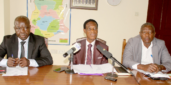 Mr. Morgan Ayawine (middle) speaking at the press conference. He is flanked by Mr. Emmanuel Baah Benimah (right) and Mr. Samuel Ananga