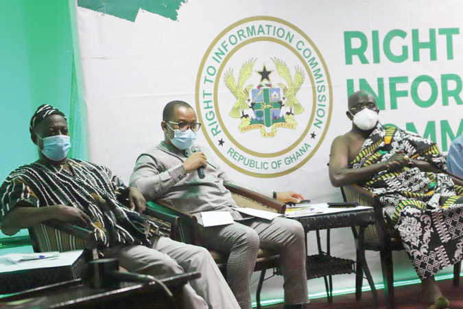  Mr Ben Abdallah Banda (with mic), a former MP for Ofinso South, speaking at the RTI Commission forum in Kumasi. Flanking him are Nana Kwame Adu (right), and Mr Justice K.A Ofori-Atta, both members of the commission. Picture: EMMANUEL BAAH