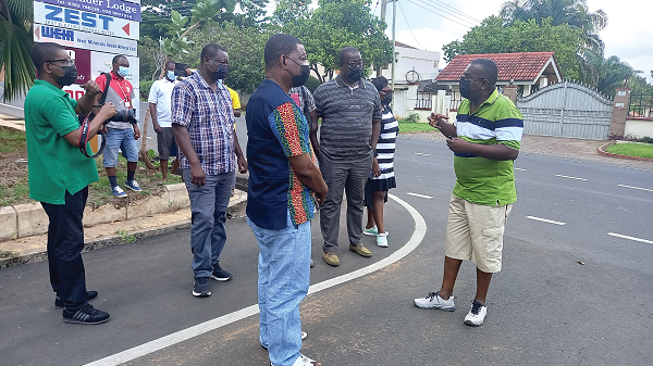 Mr Tony Asare (right), an architect, explaining some planning challenges at the Airport Residential Area, one of the areas the team visited. In the picture include Mr Kobby Asmah  (arrowed), Editor, Daily Graphic and Mr Theophilus Yartey (3rd right), Deputy Editor, Daily Graphic 