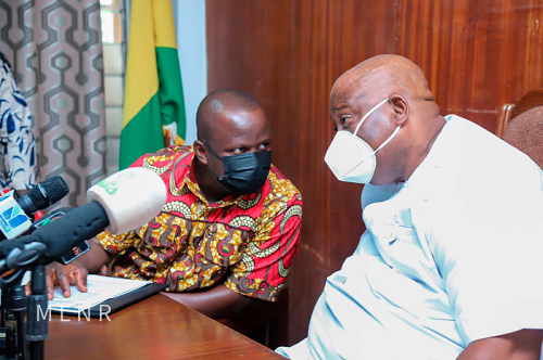 Mr Samuel Abu Jinapor (left), Minister of Lands and Natural Resources, conferring with Mr Henry Quartey, Greater Accra Regional Minister 